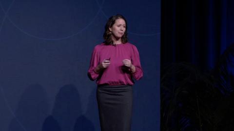 Speakers on a stage presenting at Engage Boston 2023